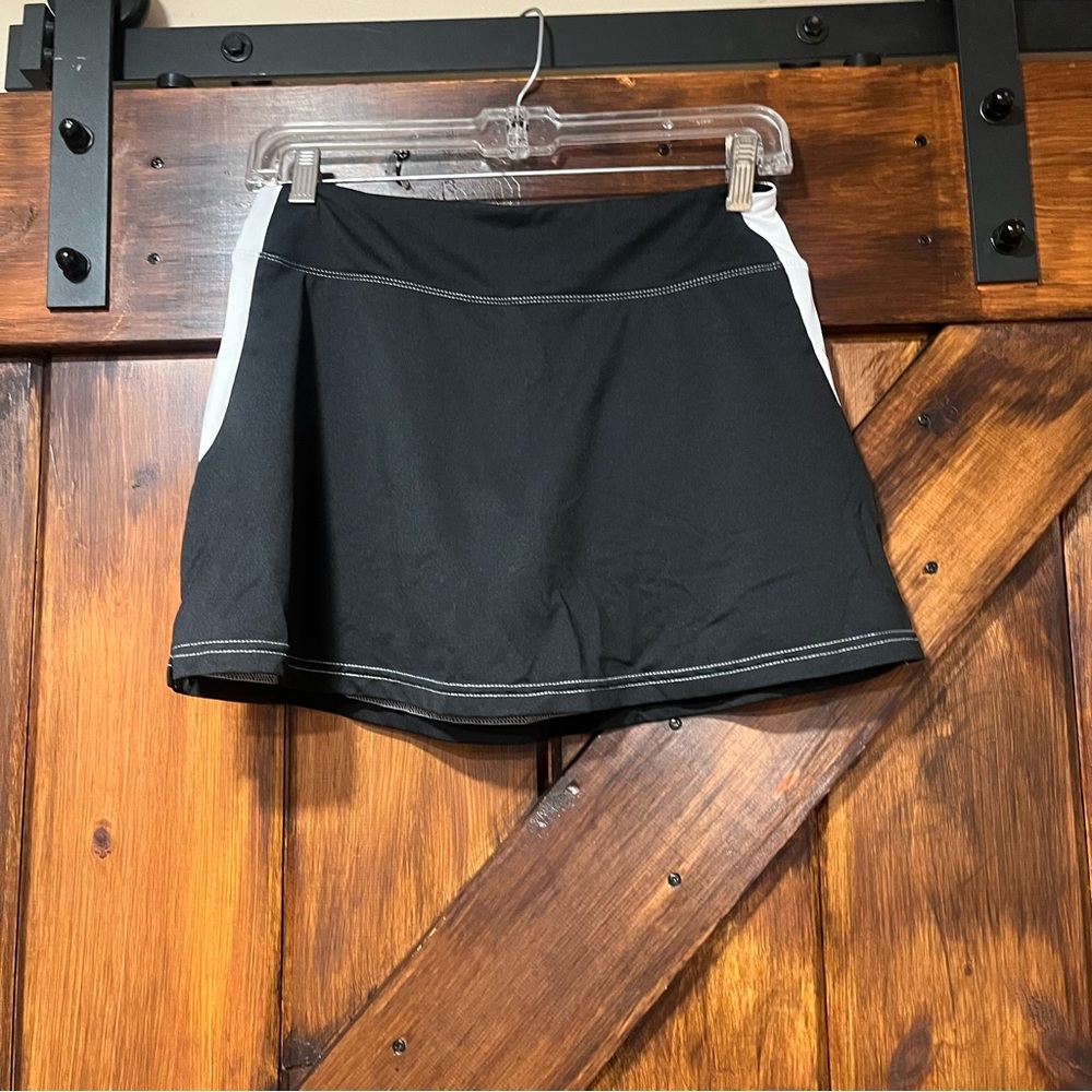SSI black tennis skirt with built in shorts